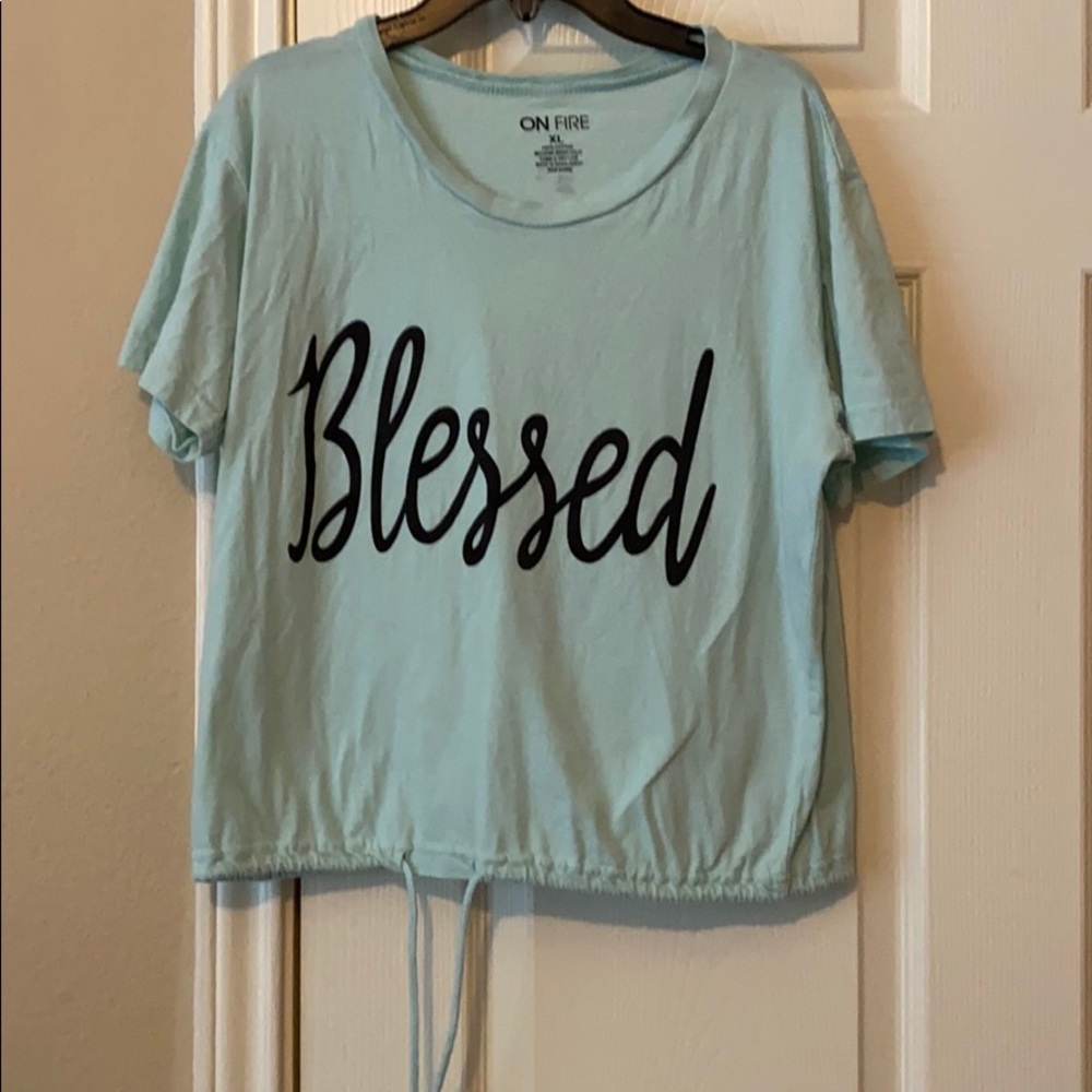 A turquoise shirt.